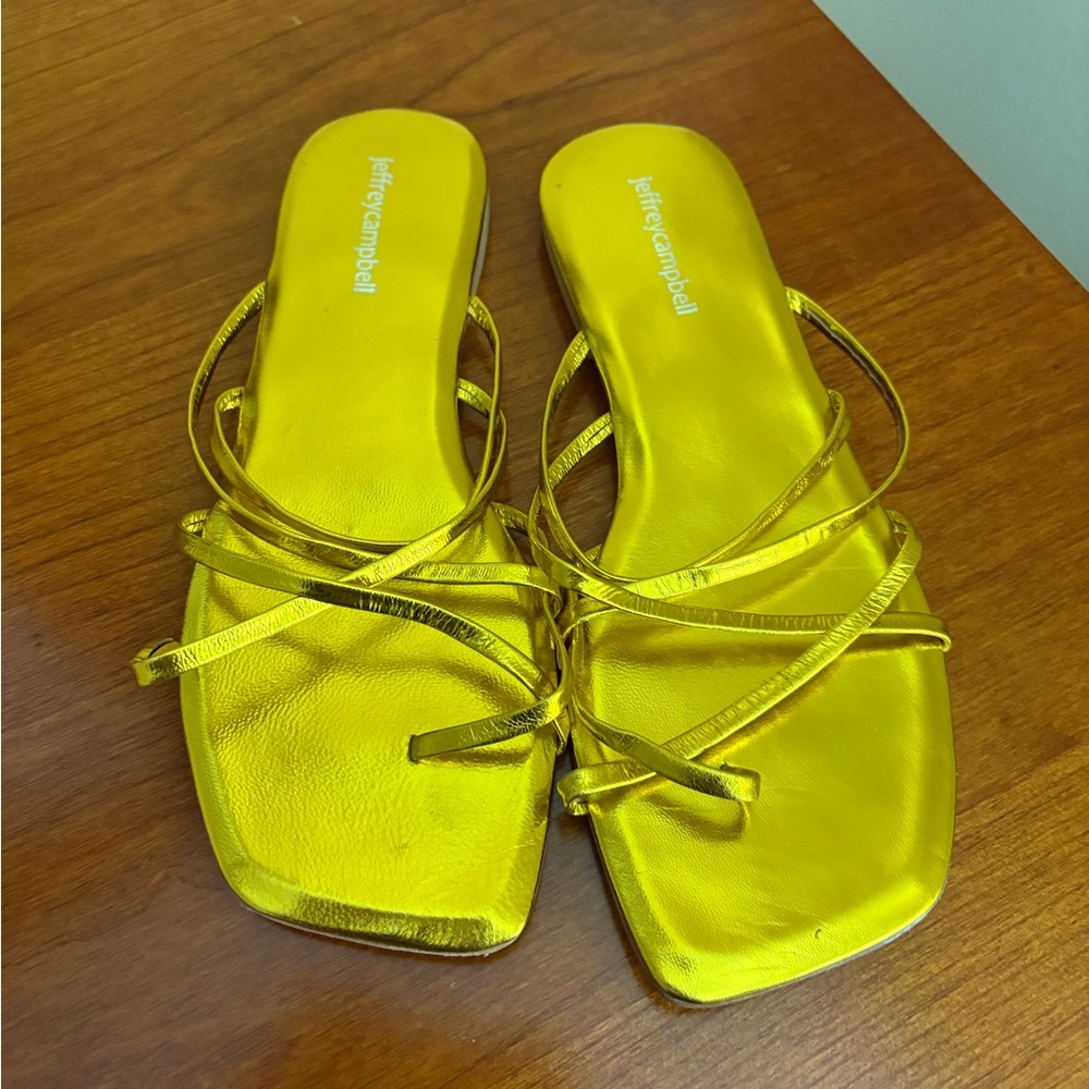 Brand new, never worn gold metalliic sandals